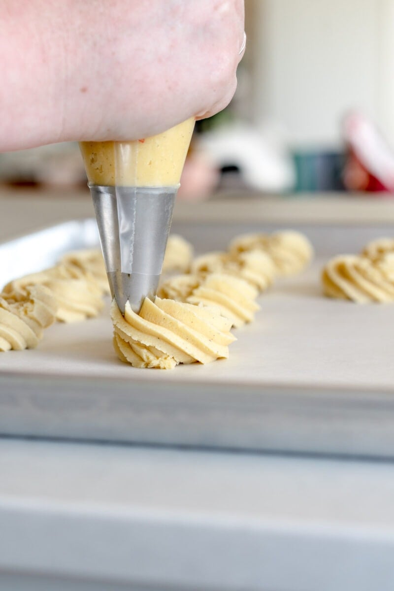 piping out butter cookies