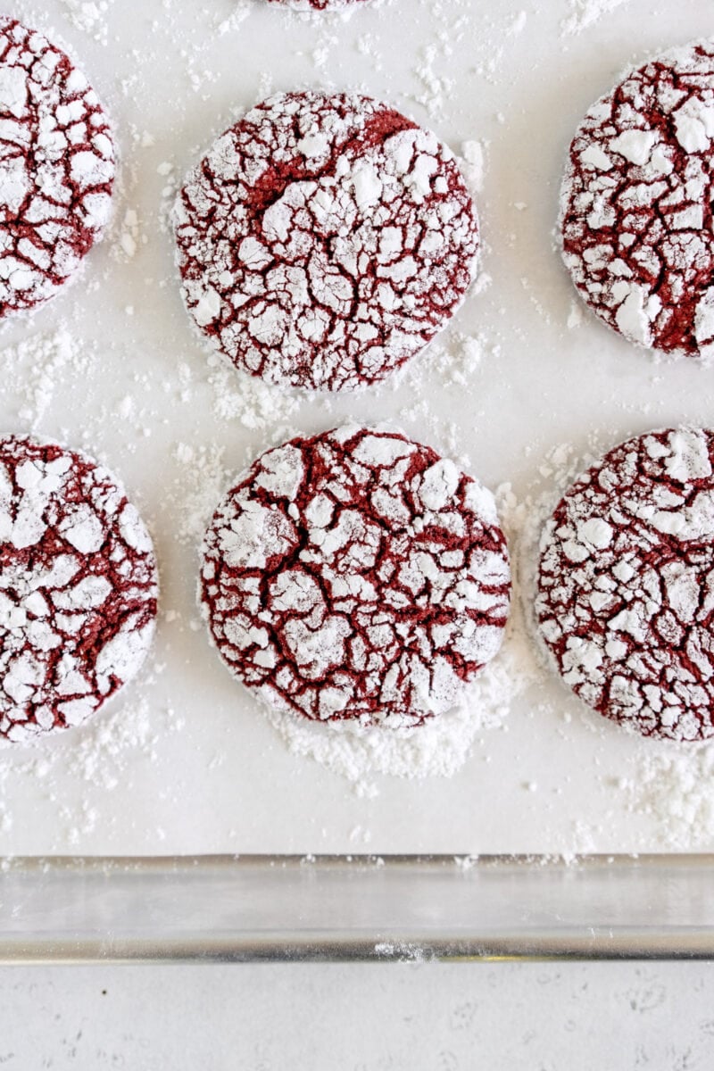 baked red velvet cookies on pan