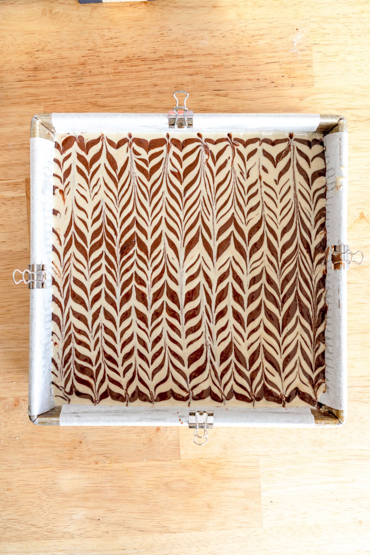 feathered piping on tahini brownies