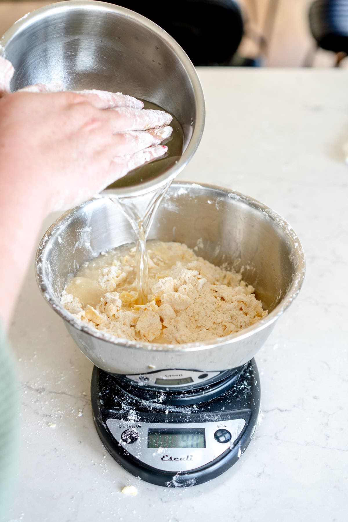adding water to pie crust
