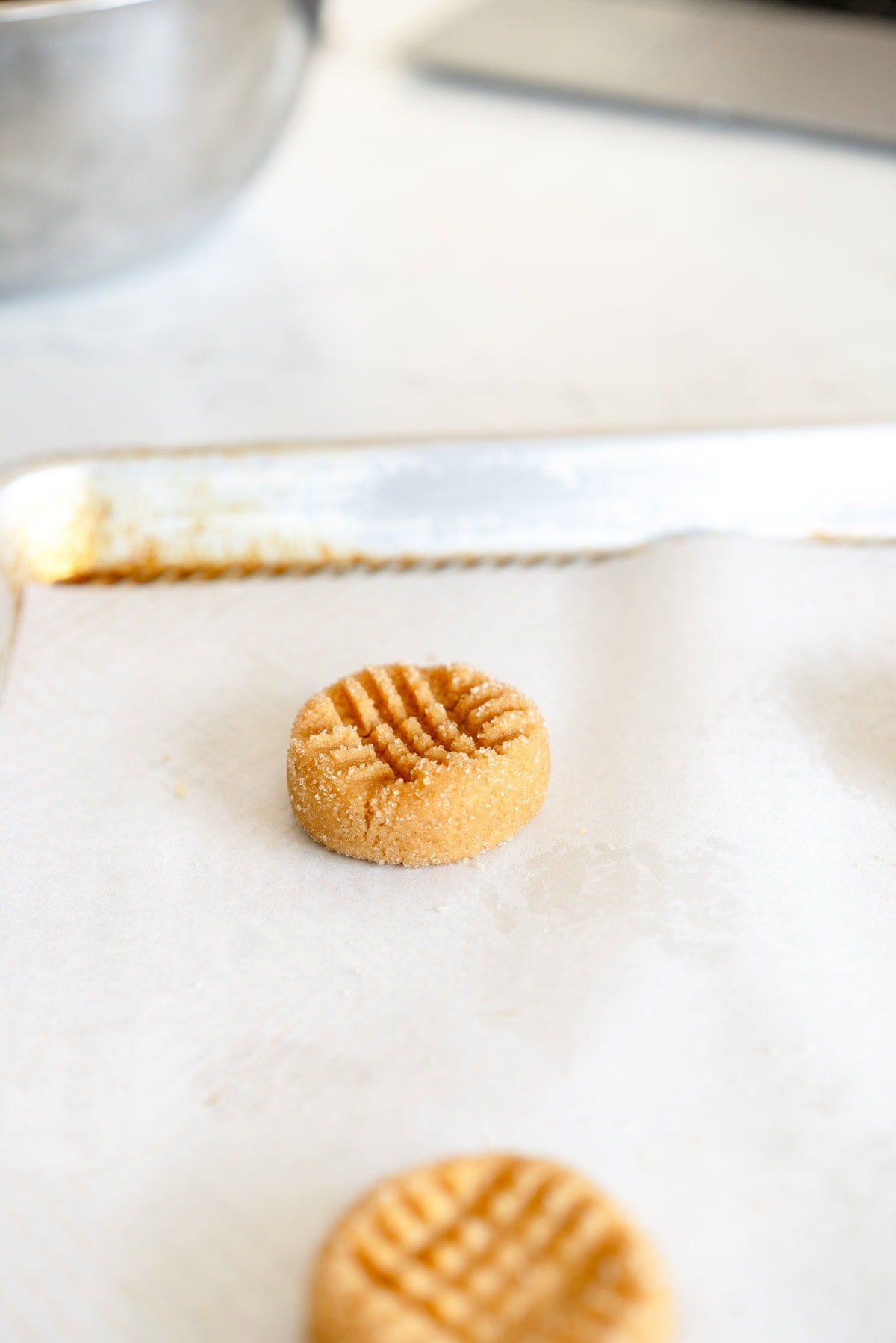 disc of peanut butter cookie batter ready for the oven