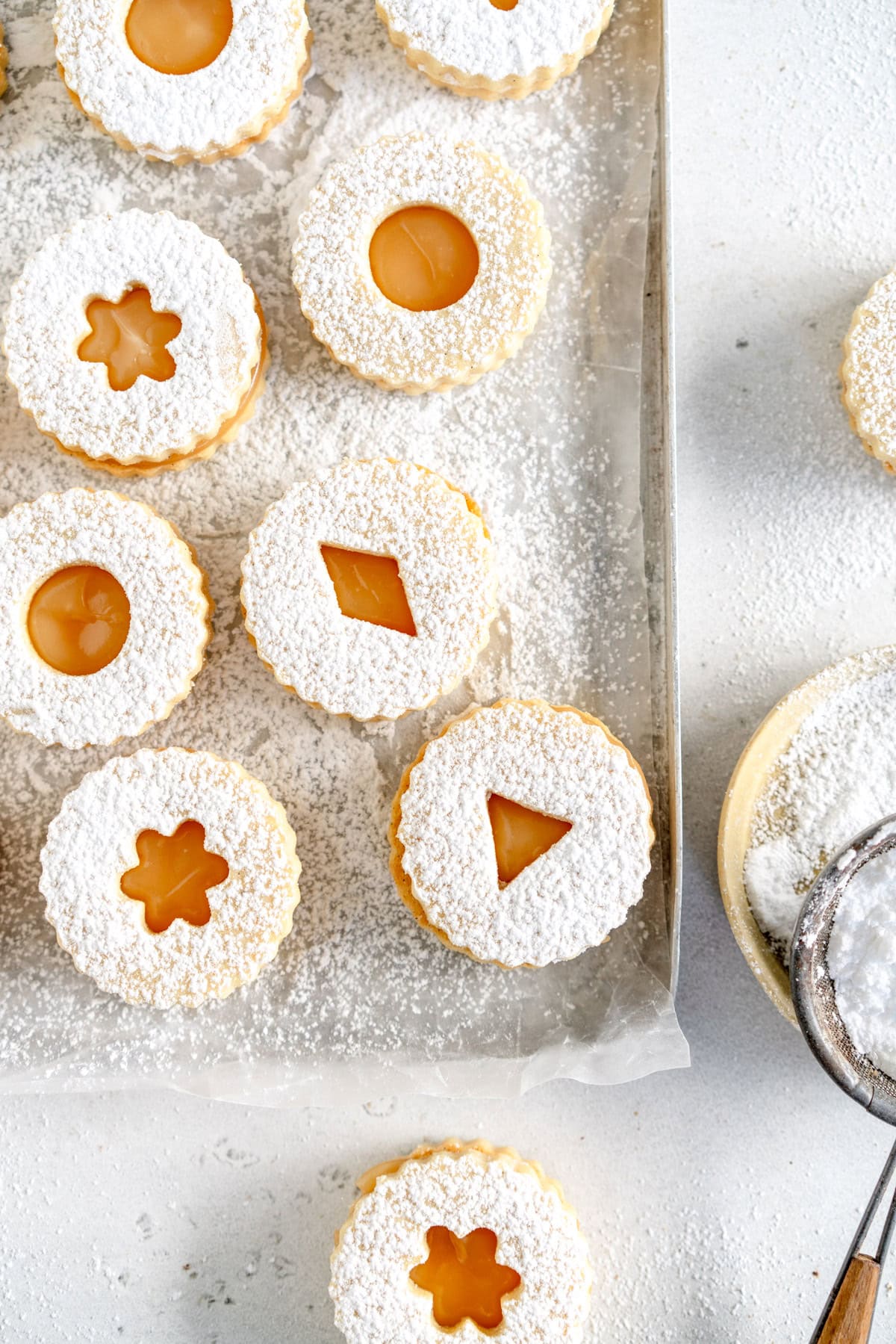 Filled Linzer cookies on pan