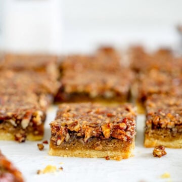 close up side on shot of pecan pie bars