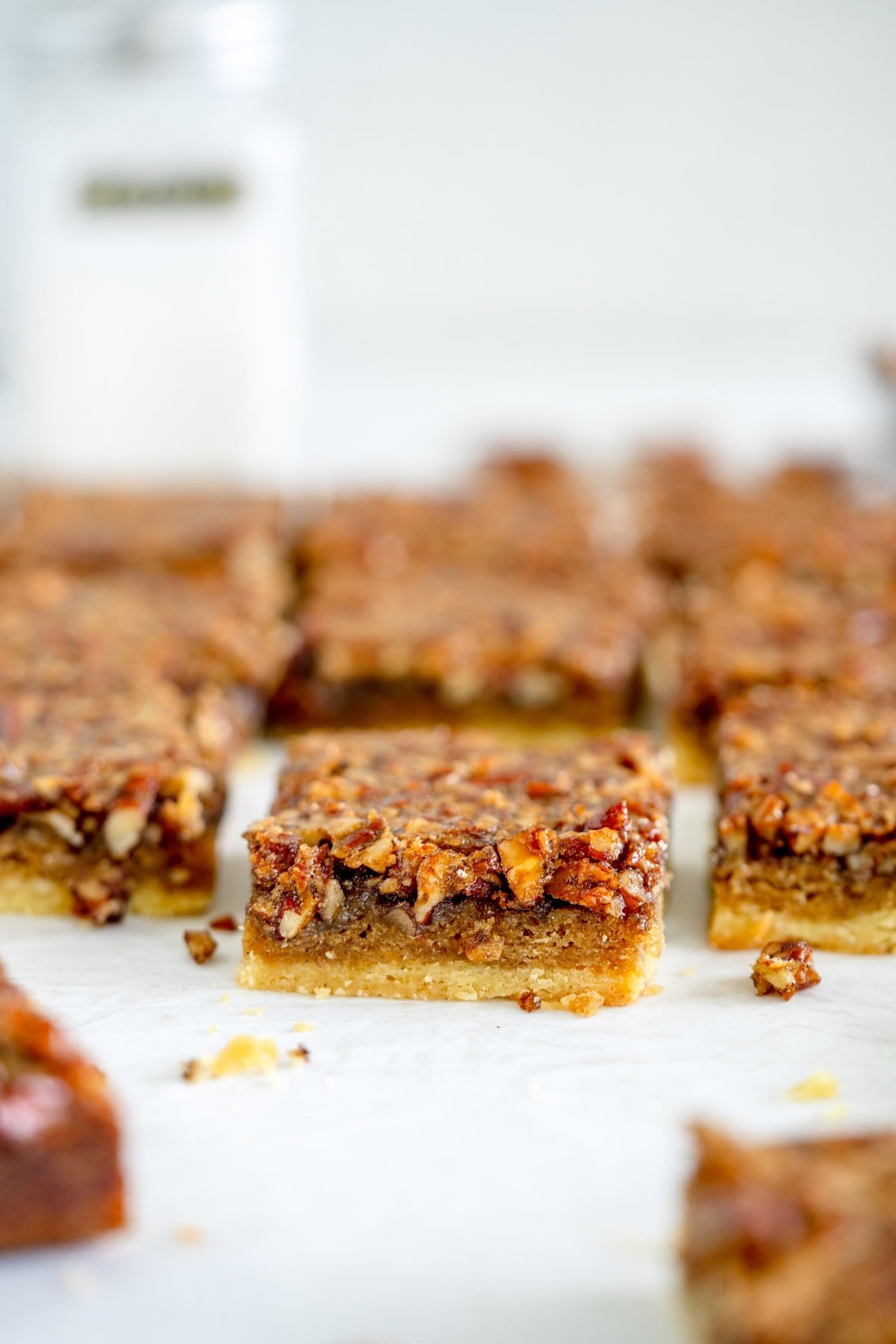 close up side on shot of pecan pie bars