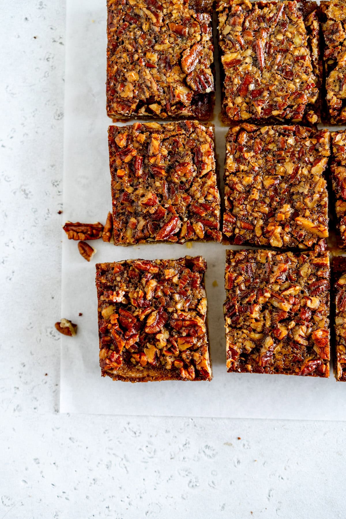 corner shot of baked pecan pie bars