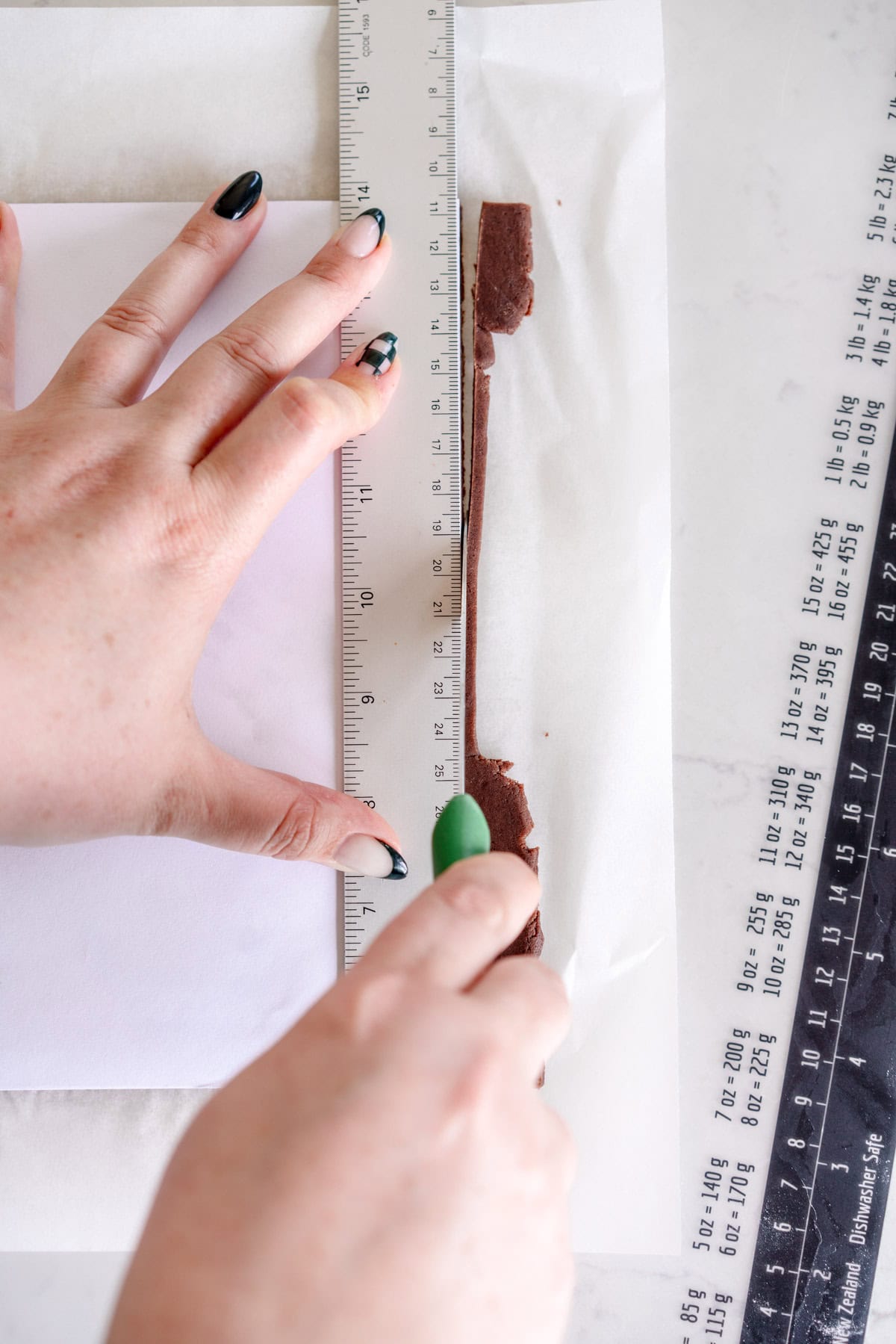 trim dough using knife