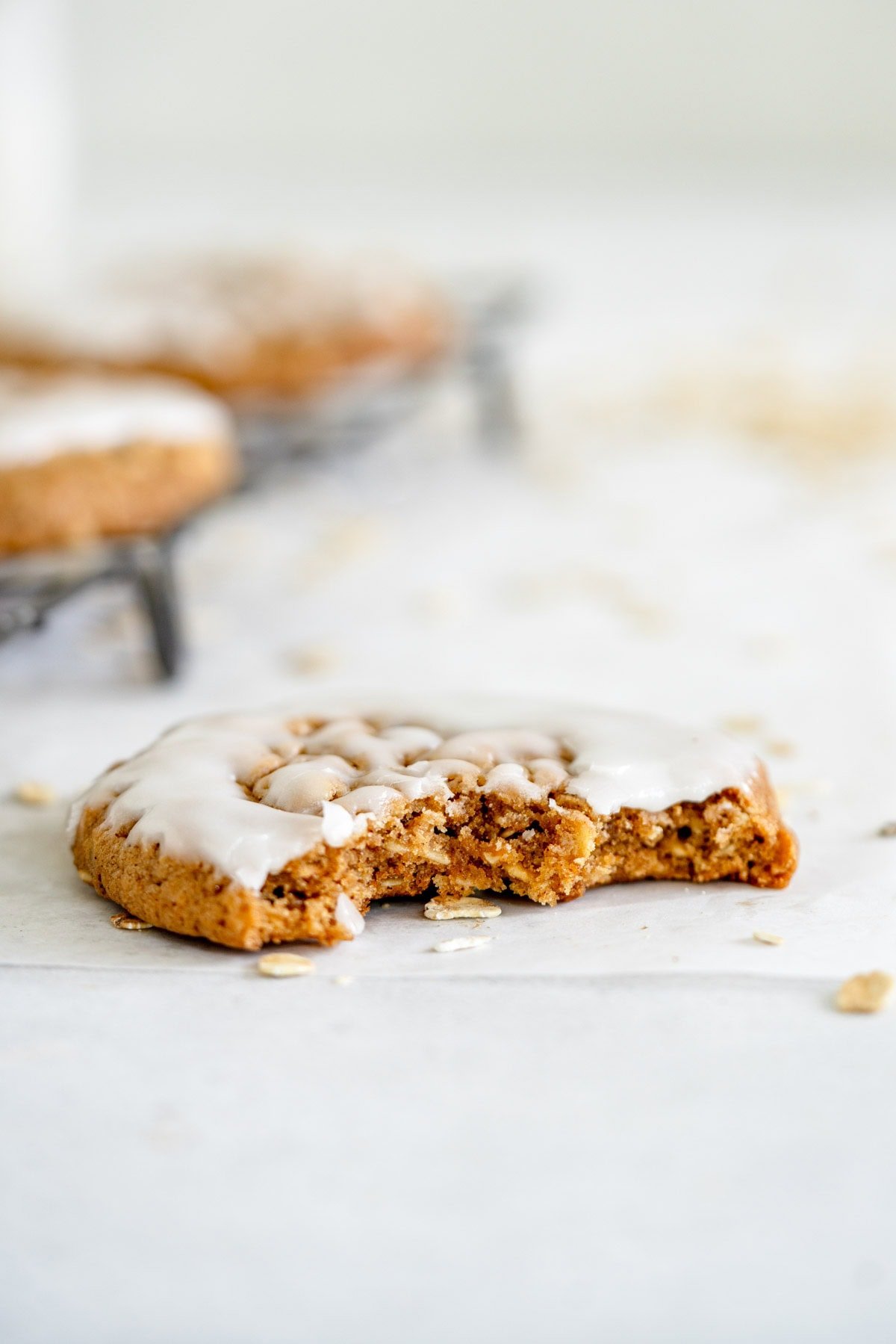 side on shot of iced oatmeal cookies