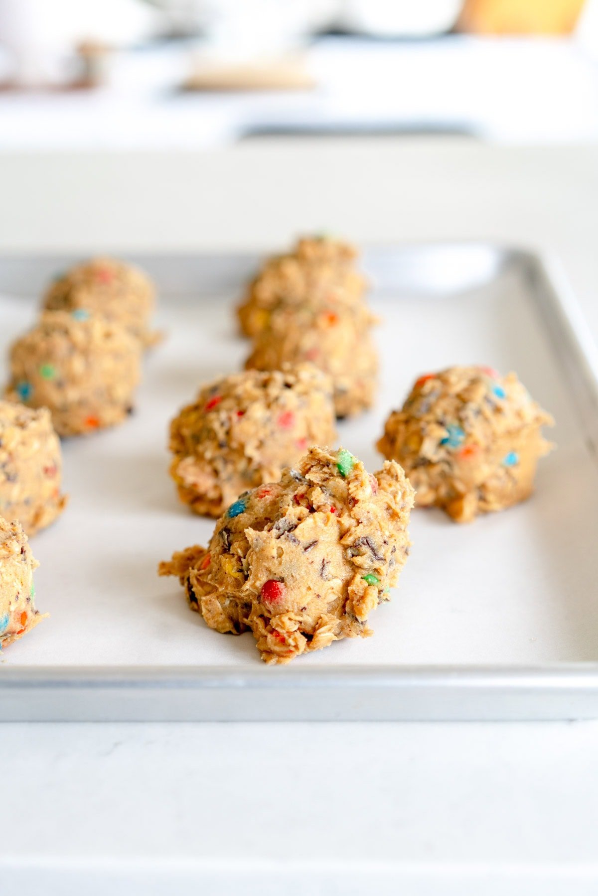 side on image of scooped monster cookies