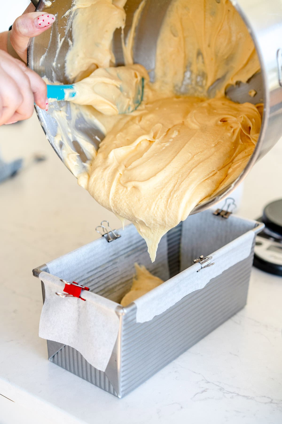 pound cake batter going into pan