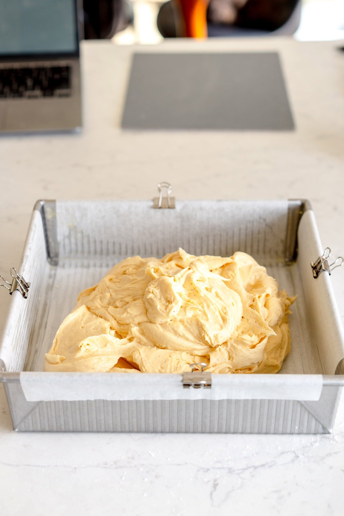 cake batter added to cake pan