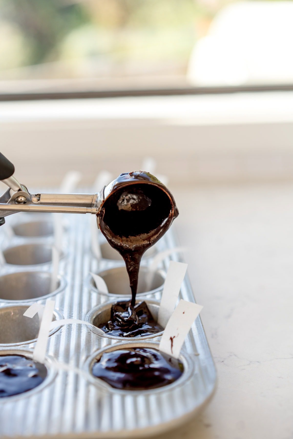 add batter to pan with scoop