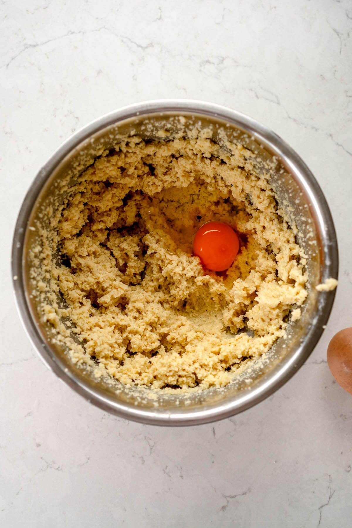 add eggs to creamed mixture