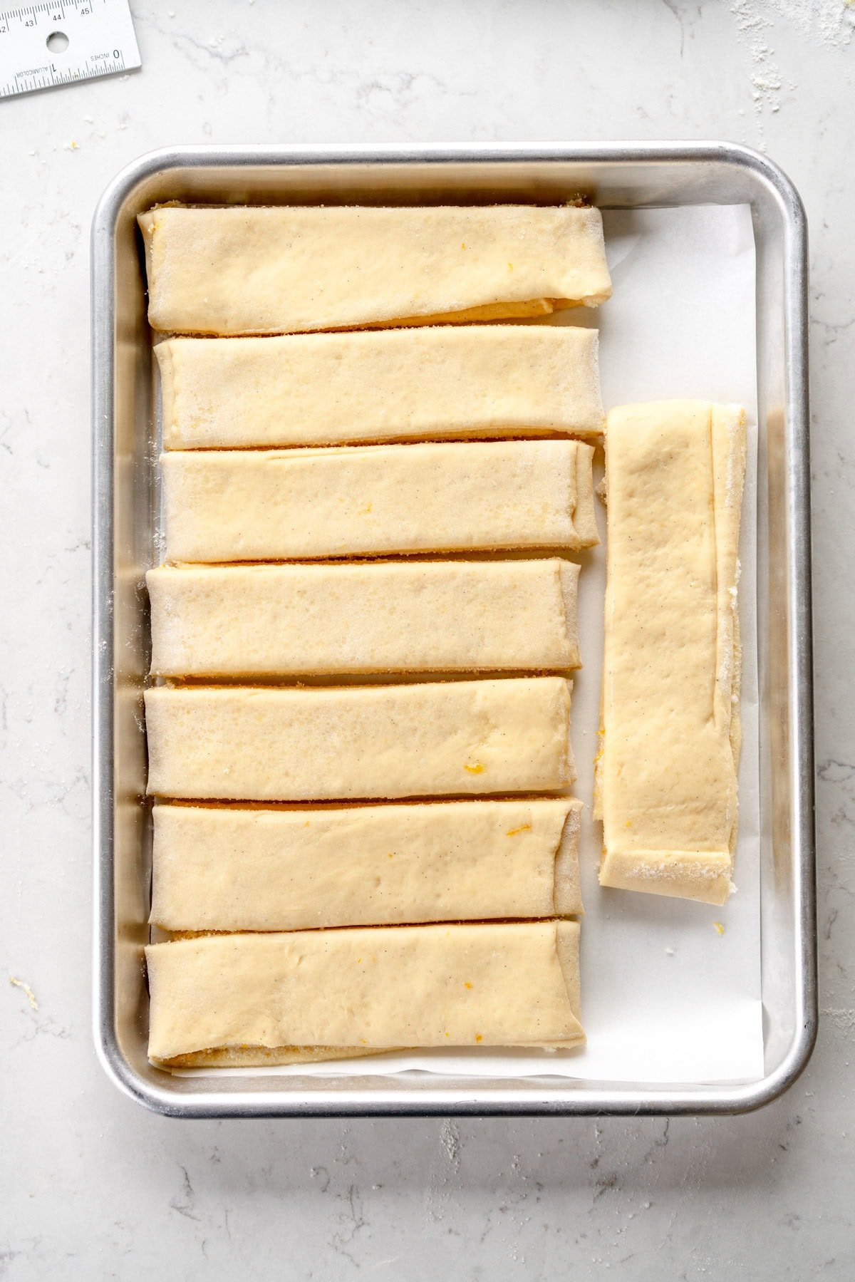 strips of dough on a sheet pan