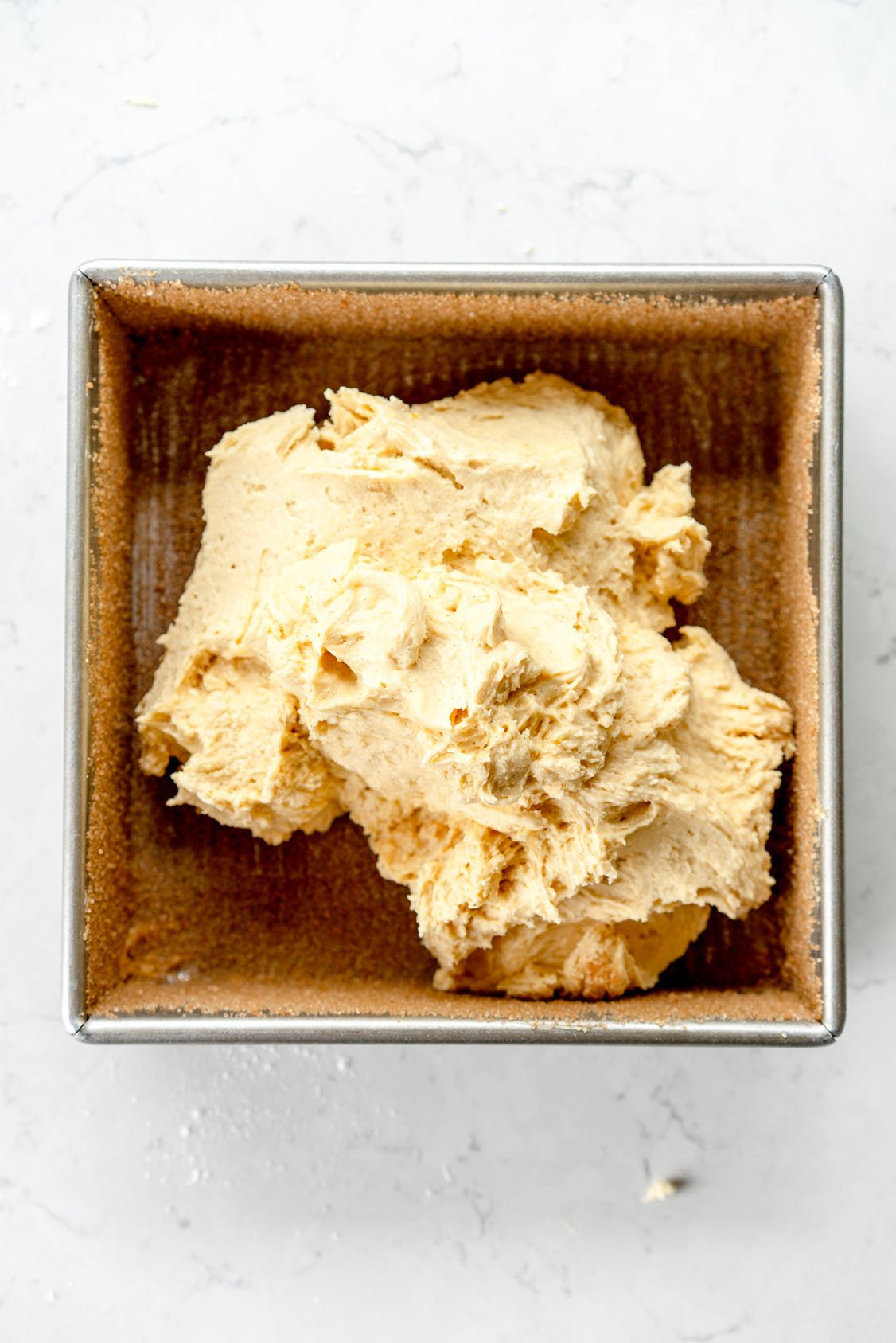 batter in cinnamon donut pan
