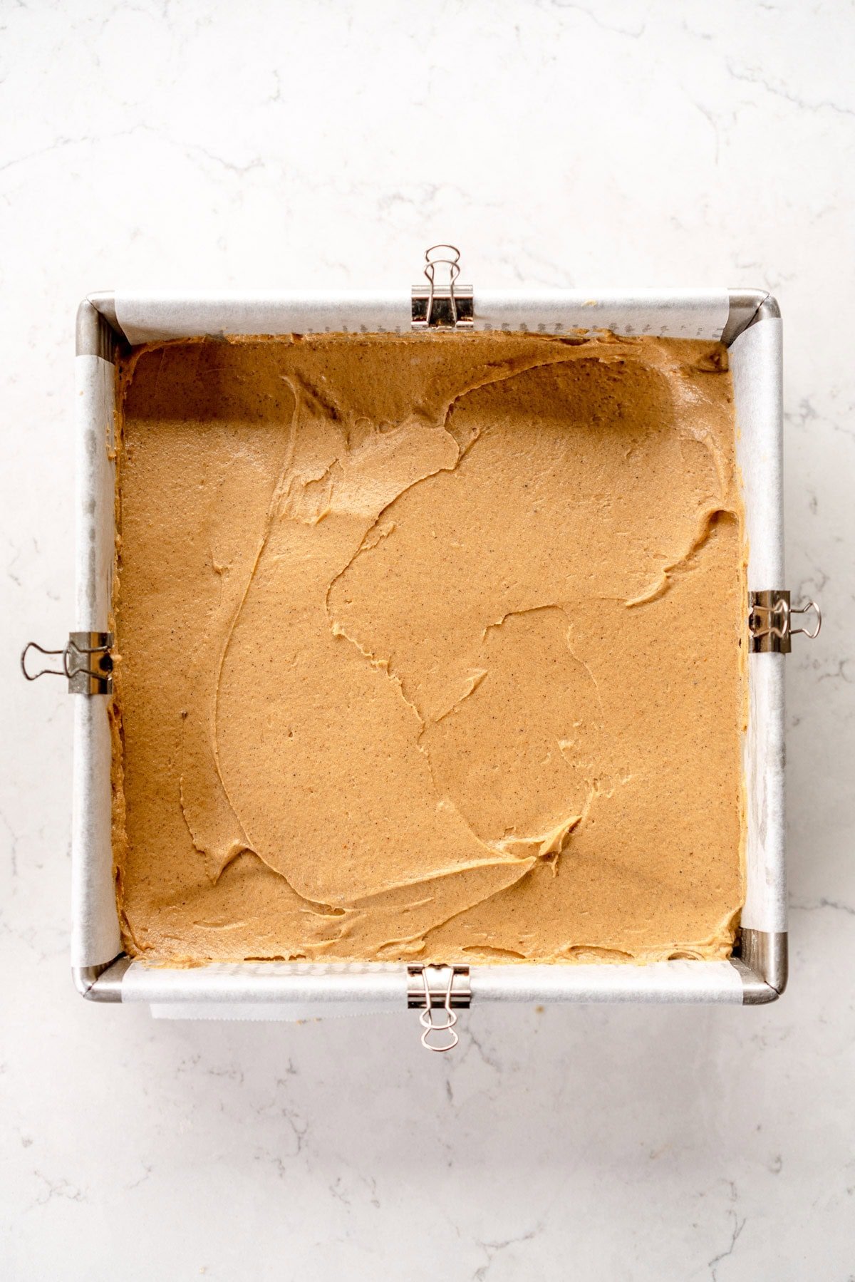 cake spread into pan